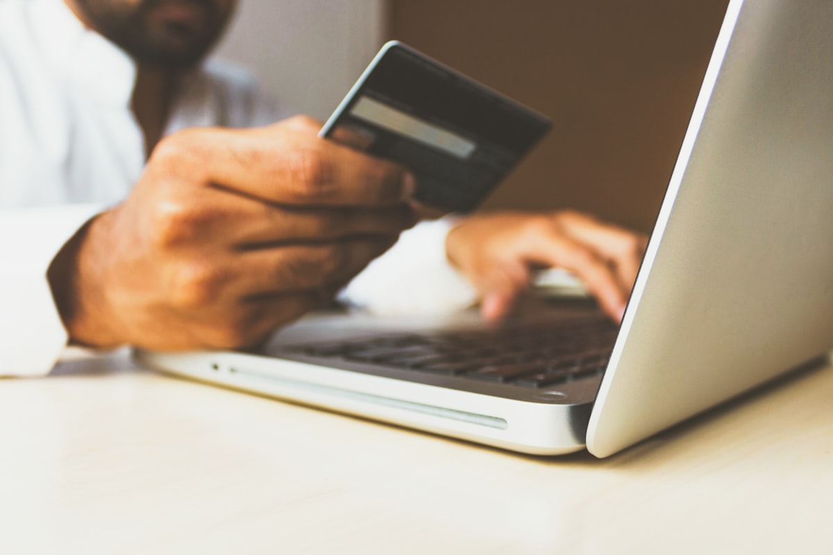 Card payment at a laptop